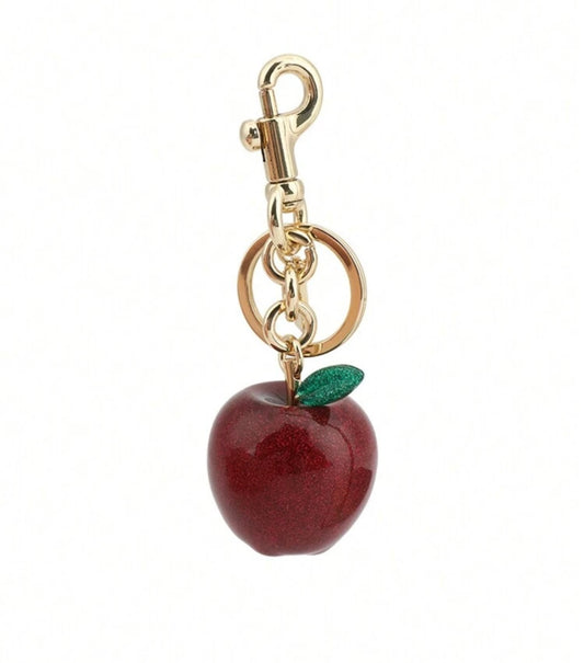 2025 trend jumbo apple keychain, maximalism must-have, bold oversized apple design, vibrant and playful bag charm, handbag upgrade, trendy personalization, statement accessory, eye-catching style, Gen Z favorite, fun and chic, standout bag charm, on-trend maximalist vibes, sweet and stylish, elevate your look, perfect gift idea, shop now, bold and trendy, unique charm, fashion-forward accessory, mix-and-match style