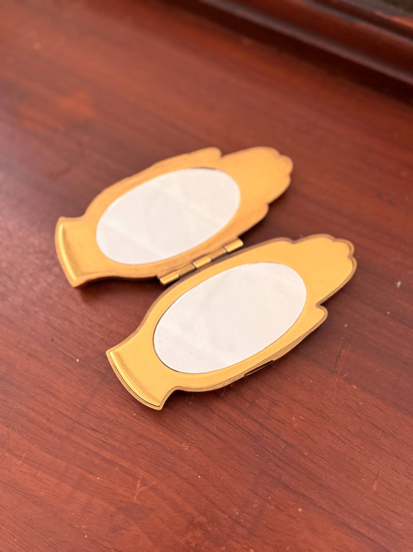 "A Helpful Hand" Handheld Compact
